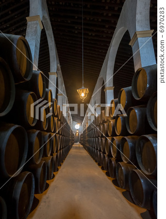 Sherry barrels in Jerez bodega, Spain Sherry barrels in Jerez bodega, Spain 6970283