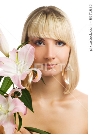 Beautiful girl with pink lily isolated on white background Beautiful girl with pink lily isolated on white background 6971683
