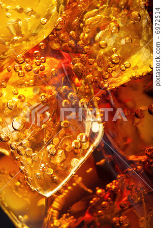Close up view of the ice cubes in cola Close up view of the ice cubes in cola 6972514
