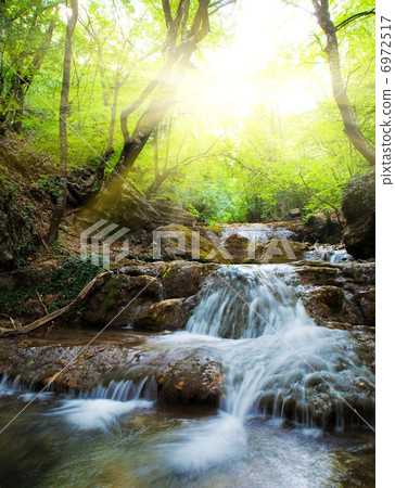Waterfall in the early morning. Waterfall in the early morning. 6972517