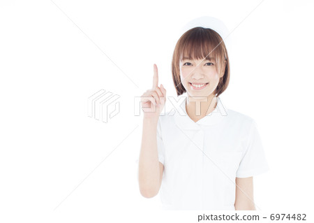 Pointing female nurse Pointing female nurse 6974482