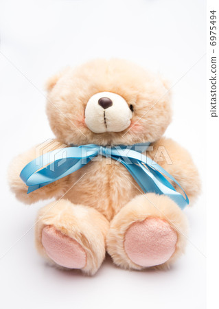 Teddy bear with blue ribbon 6975494