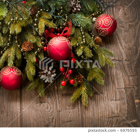 Christmas Decoration. Holiday Decorations over wooden background 6976593