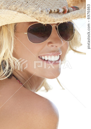 Sexy Blond Girl In Aviator Sunglasses and Straw Cowboy Hat 6976863