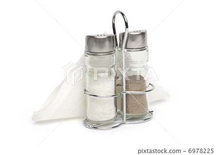 Salt and pepper shaker on a white Salt and pepper shaker on a white 6978225