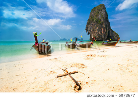 Tropical beach landscape. Thai traditional long tail boats 6978677