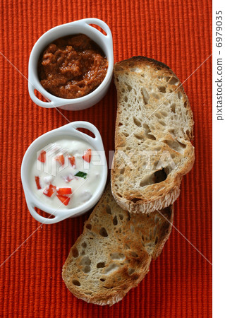 toasts with dip in bowls 6979035