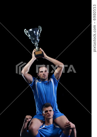 soccer players celebrating victory 6980553