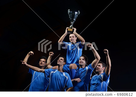 soccer players celebrating victory 6980612