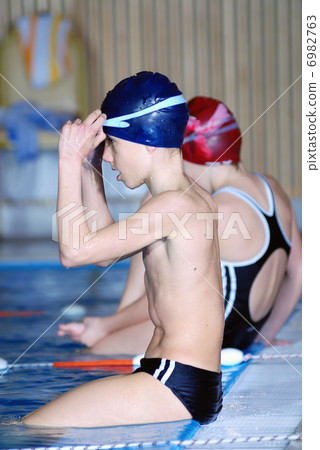 .young swimmer 6982763