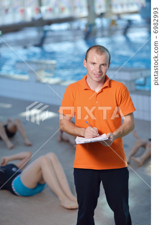 happy children group at swimming pool 6982993