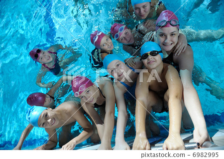 happy children group at swimming pool 6982995