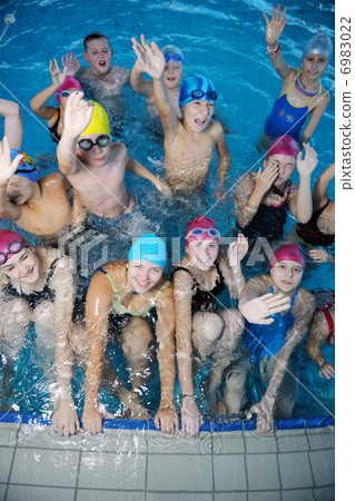 happy childrens at swimming pool happy childrens at swimming pool 6983022