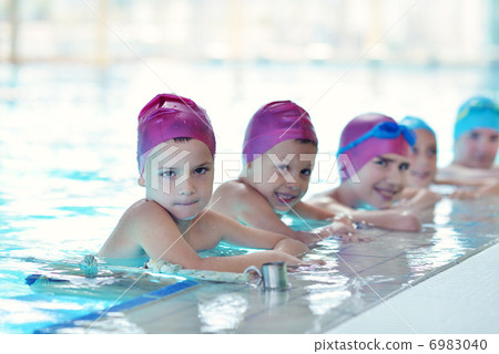 happy children group at swimming pool 6983040