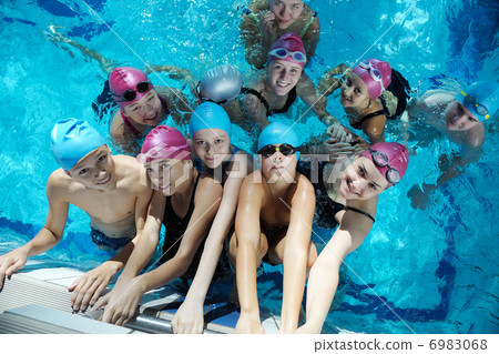 happy children group at swimming pool 6983068