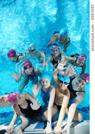 happy children group at swimming pool 6983085