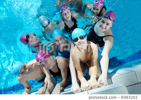happy children group at swimming pool 6983201