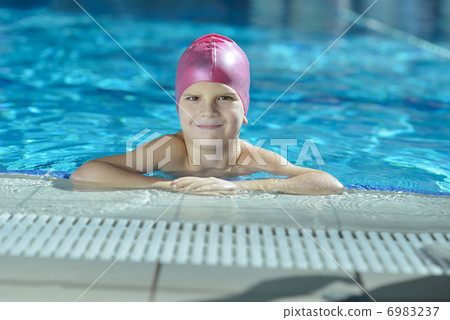 happy child on swimming pool happy child on swimming pool 6983237