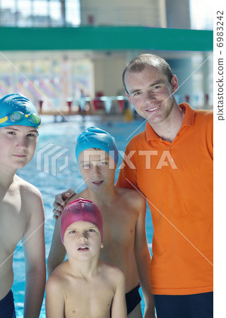 happy children group at swimming pool 6983242