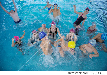 happy children group at swimming pool happy children group at swimming pool 6983315