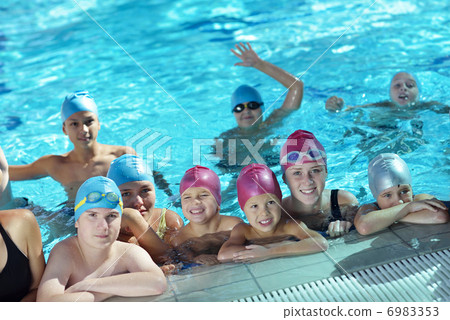 happy children group at swimming pool 6983353