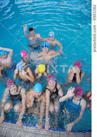 happy children group at swimming pool 6983362