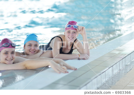 happy children group at swimming pool 6983366