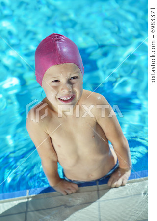 happy child on swimming pool happy child on swimming pool 6983371