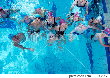 happy children group at swimming pool 6983447