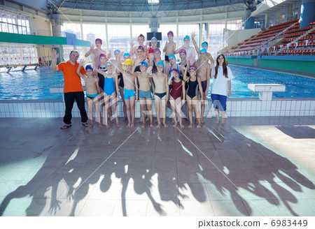 happy children group at swimming pool 6983449