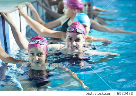 happy children group at swimming pool 6983488