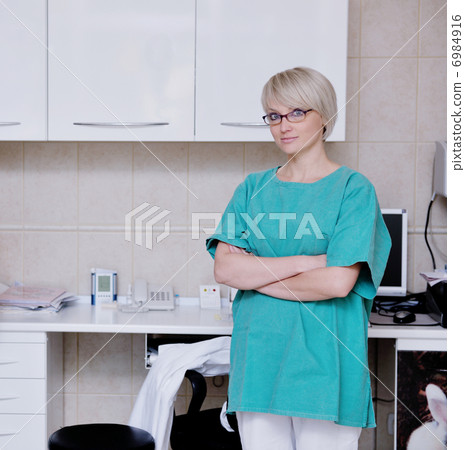 veterinarian and assistant in a small animal clinic veterinarian and assistant in a small animal clinic 6984916