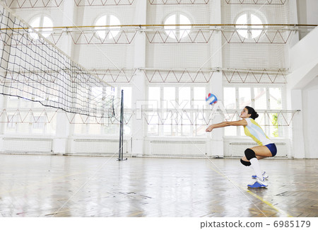 girls playing volleyball indoor game girls playing volleyball indoor game 6985179