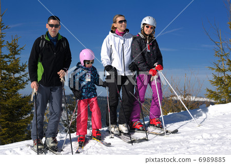 portrait of happy young family at winter portrait of happy young family at winter 6989885