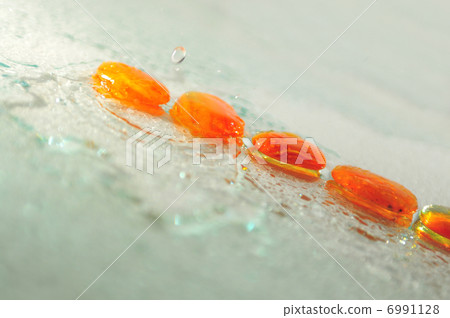isolated wet zen stones with splashing water drops 6991128