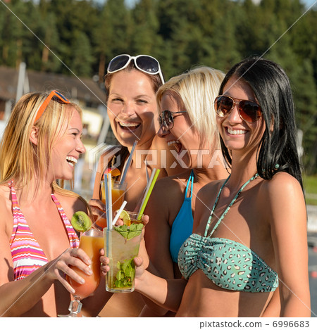 Young women in bikini partying with cocktails 6996683