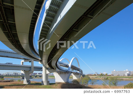 Five-color cherry tree bridge over Arakawa, Mt. Fuji and blue sky Five-color cherry tree bridge over Arakawa, Mt. Fuji and blue sky 6997763