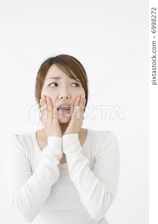 A young lad frown face 6998272