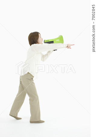 A woman shouting with a megaphone 7002845