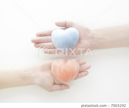 Heart on palm 7003292