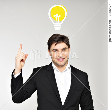 Business man with an idea bulb Business man with an idea bulb 7006473