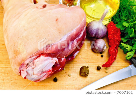 Meat shank with spices on the board 7007161