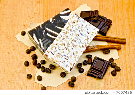 Soap homemade with chocolate and coffee on board 7007426