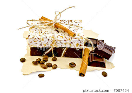 Soap homemade with chocolate and cinnamon on paper 7007434