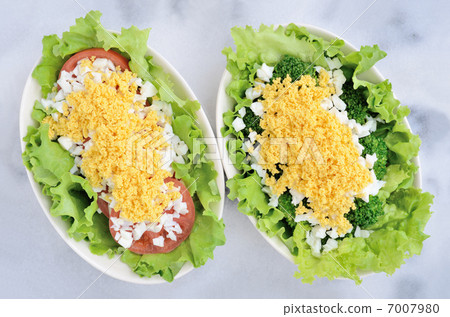 Mimosa salad of tomato and mimosa salad of broccoli Mimosa salad of tomato and mimosa salad of broccoli 7007980