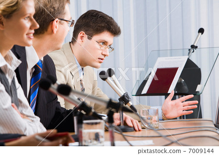 Man at a seminar Man at a seminar 7009144