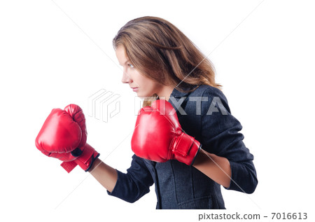 Angry businesswoman with boxing gloves Angry businesswoman with boxing gloves 7016613