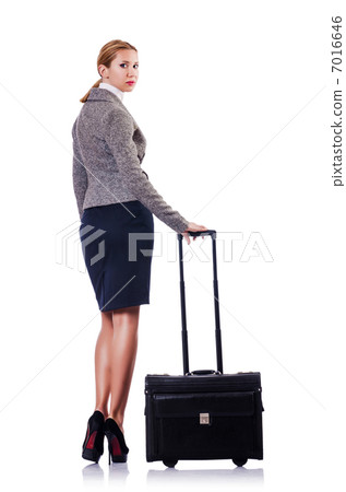 Businesswoman with suitcase on white Businesswoman with suitcase on white 7016646