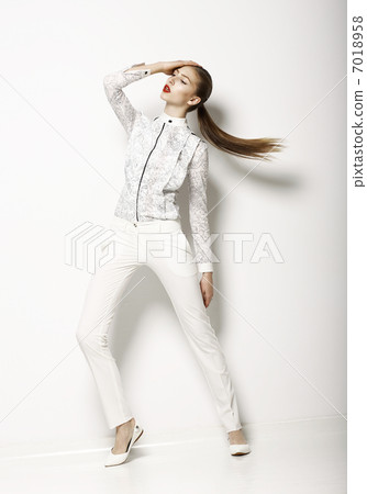 Contemporary Clothing Design. Modish Woman in White Blouse and Pants. Fashion Contemporary Clothing Design. Modish Woman in White Blouse and Pants. Fashion 7018958