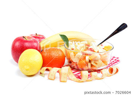 Fresh fruits and salad isolated on a white background. Fresh fruits and salad isolated on a white background. 7026604